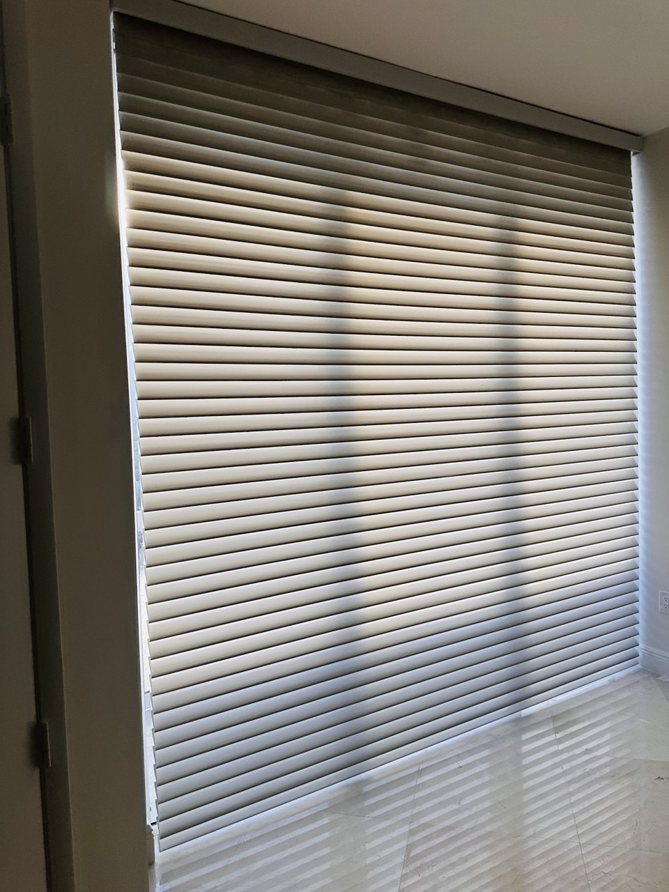 Custom motorized Shangri-La shades installation near Miami