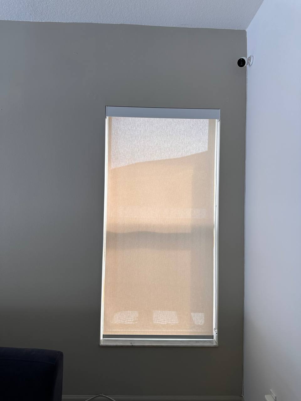 Light-filtering roller sunscreen shade with valance in a Hollywood FL room