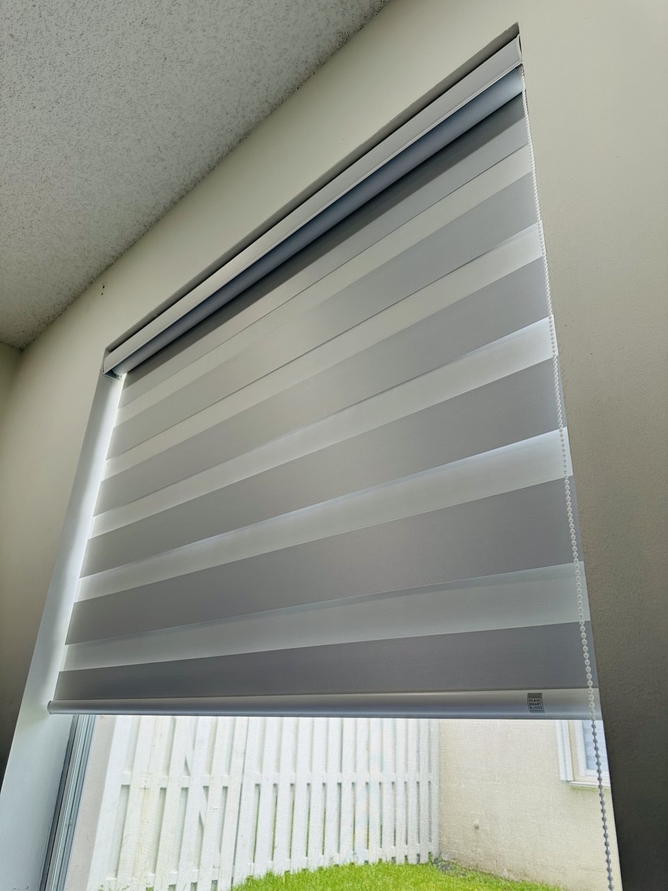 Side view of a custom zebra shade in a Fort Lauderdale bedroom