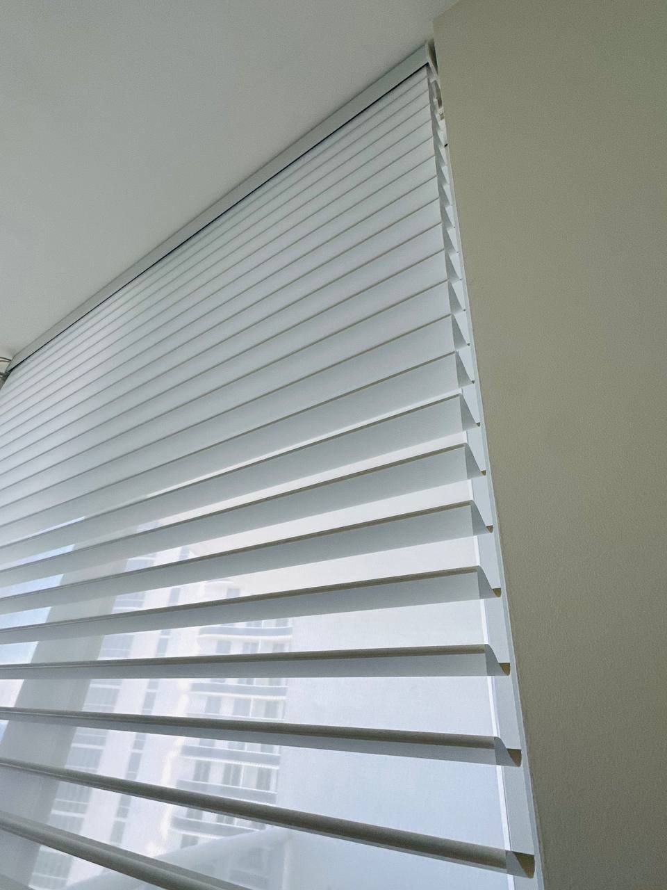 Close-up of layered Shangri-La shade fabric filtering daylight in Miami