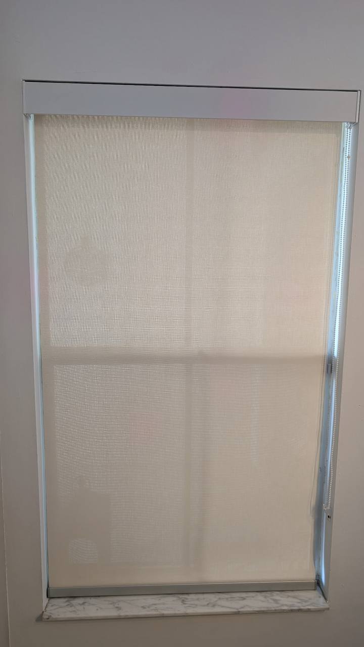 Close view of solar screen fabric on a custom window shade in Hollywood FL