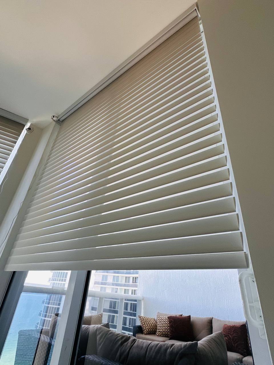 Shangri-La shade installed over a sliding glass door in a Miami residence