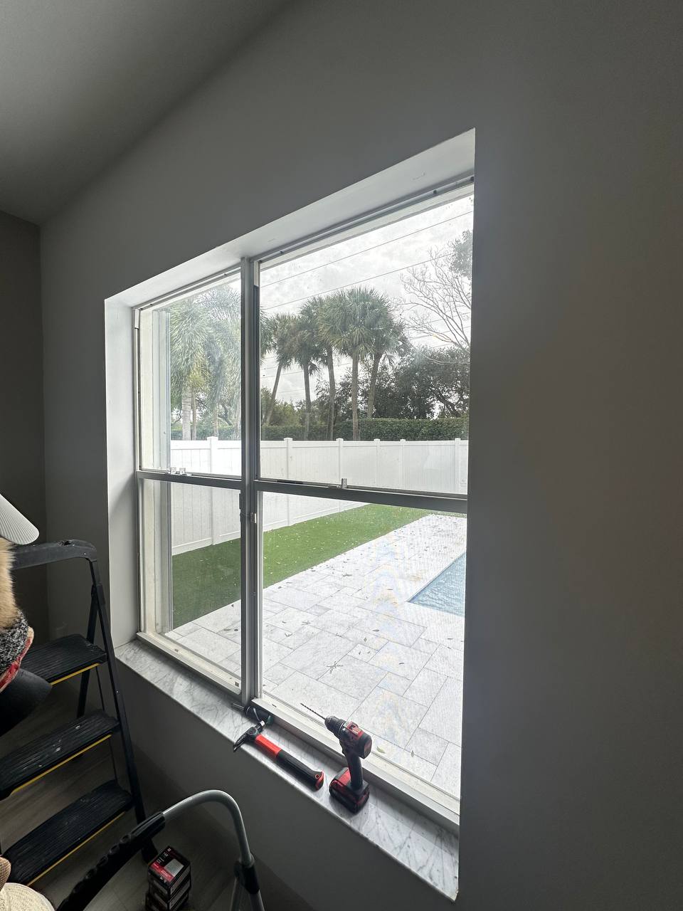 Uncovered window before sunscreen shade installation in Hollywood FL home