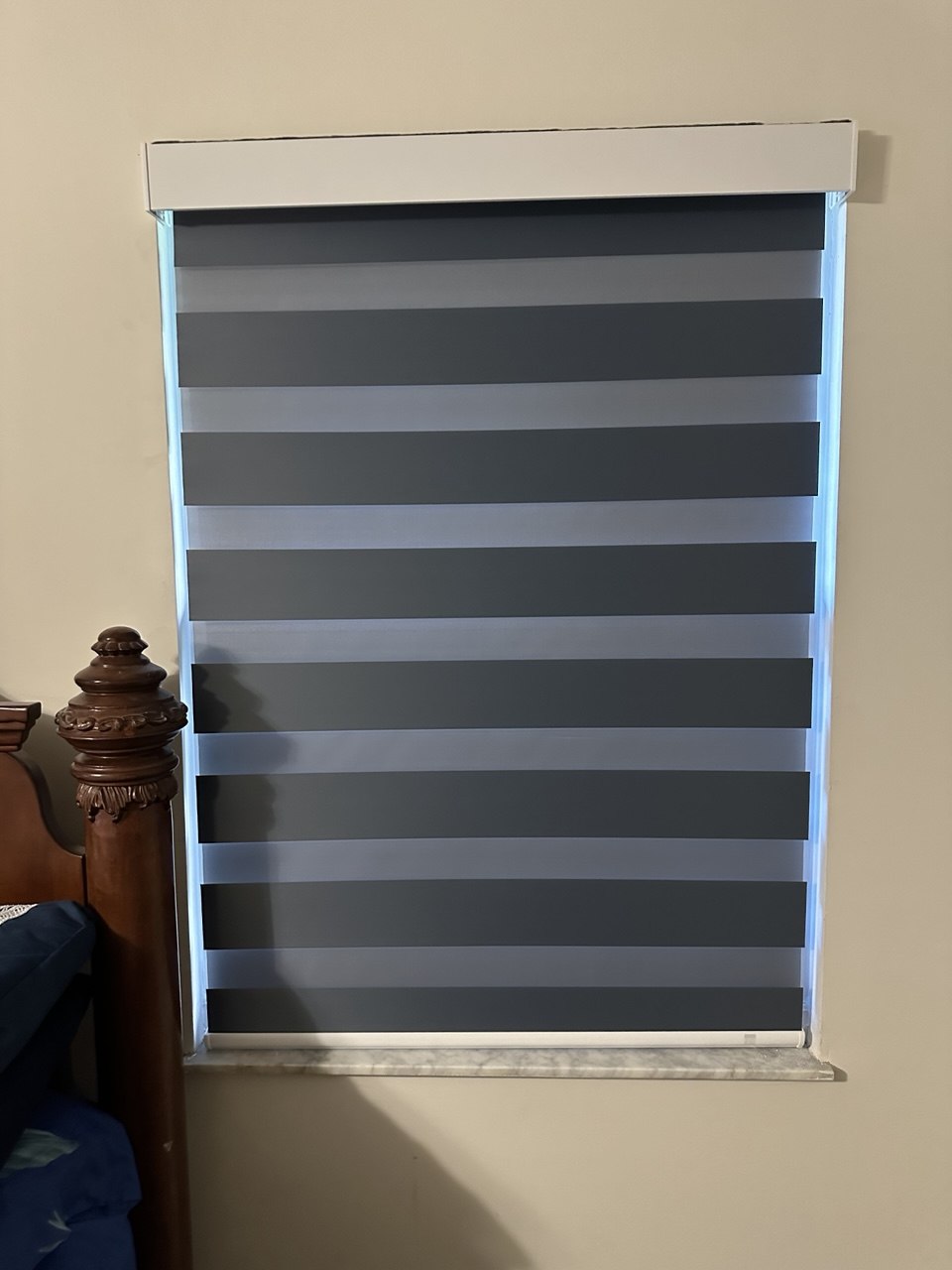 Zebra shades with alternating sheer and solid bands in a Miami residence