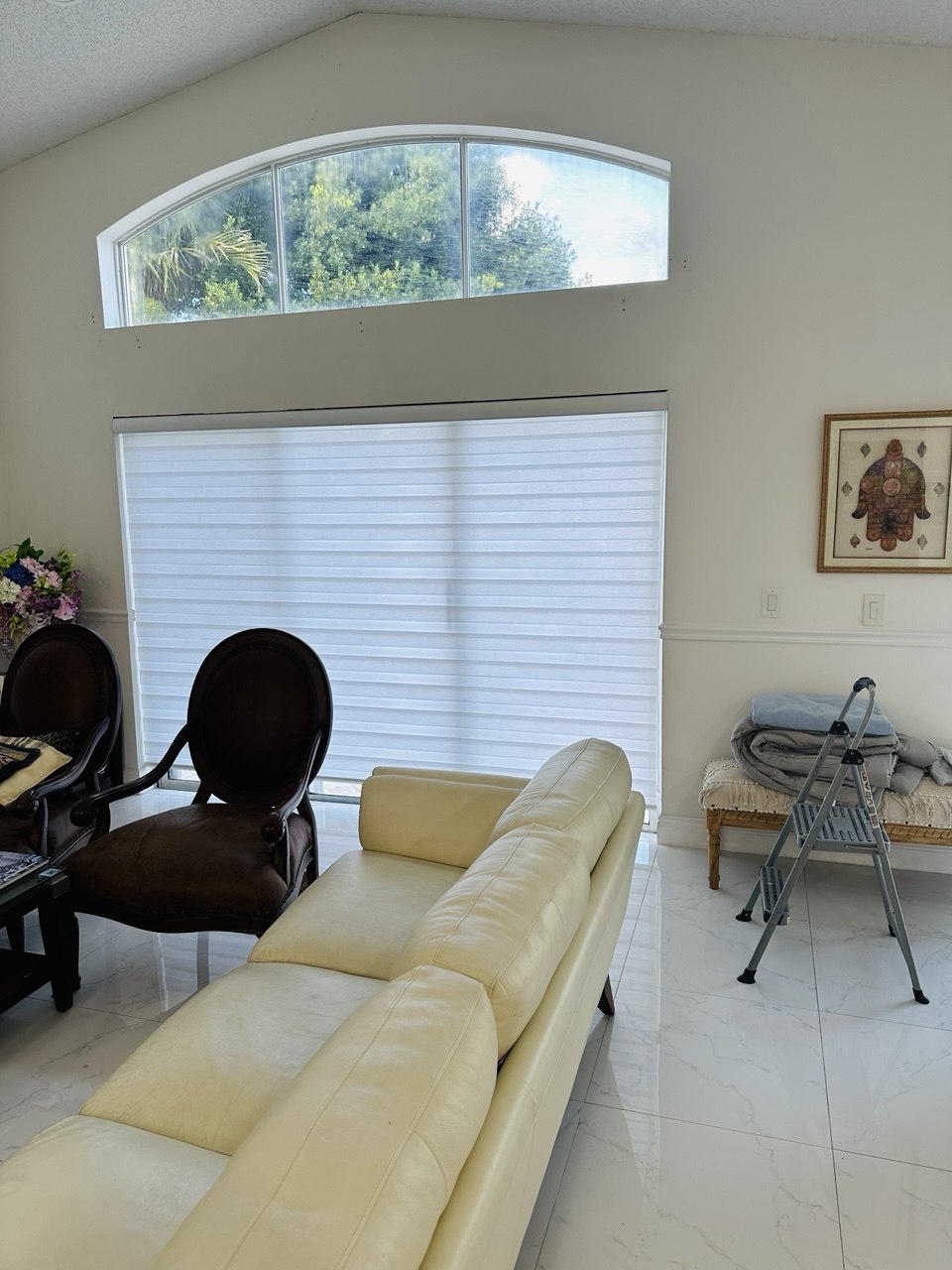 Custom zebra shades in a Fort Lauderdale living area with wide glass opening