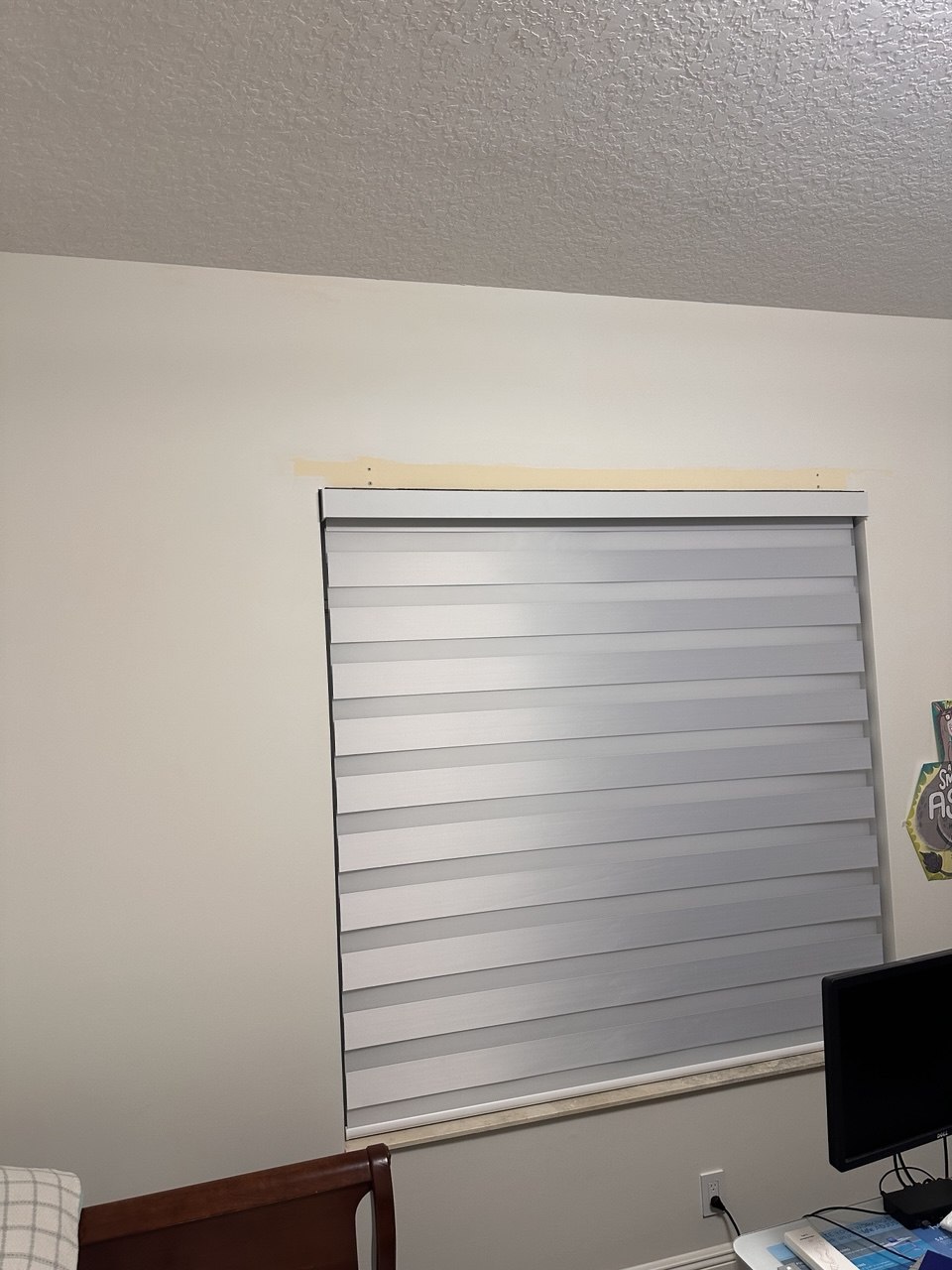 Zebra blackout shade inside-mounted on the home office window in Delray Beach