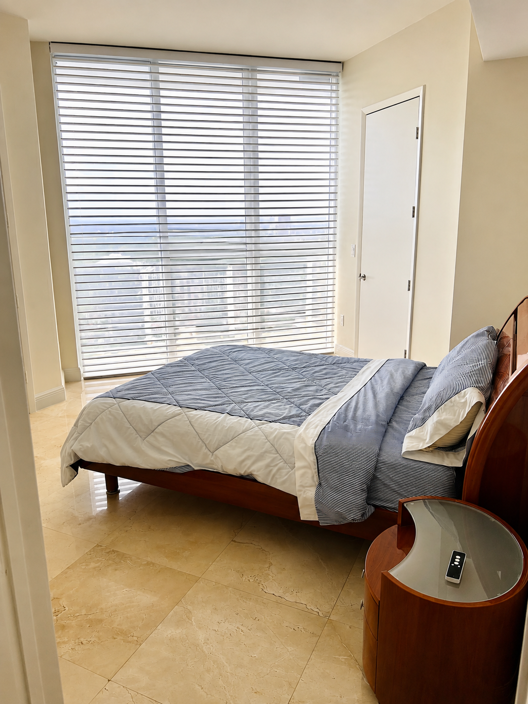 Motorized Shangri-La shades closed for privacy in a Miami area residence