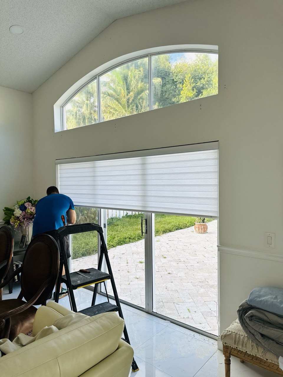 Zebra shade installation process on a large living room opening in Fort Lauderdale