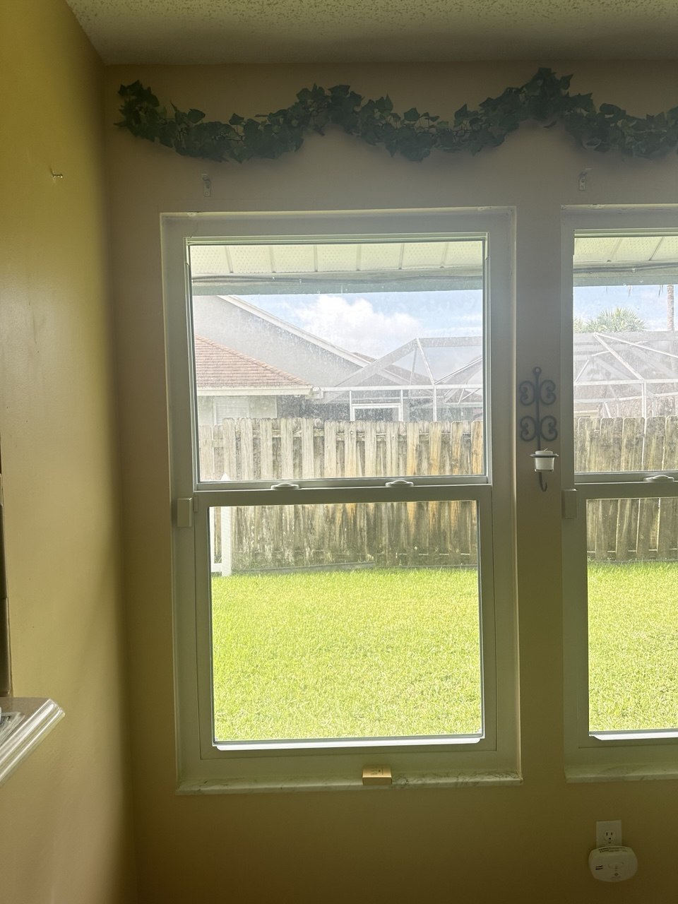 Window before blackout roller shade installation in Royal Palm Beach